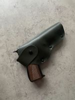 Пистолет в кобуре