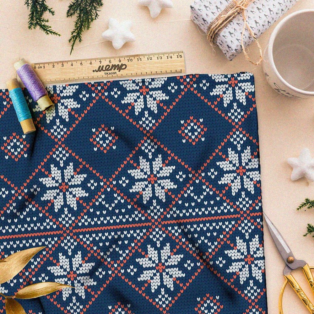 Ткань шифон красно-белая вышивка на синем свитере