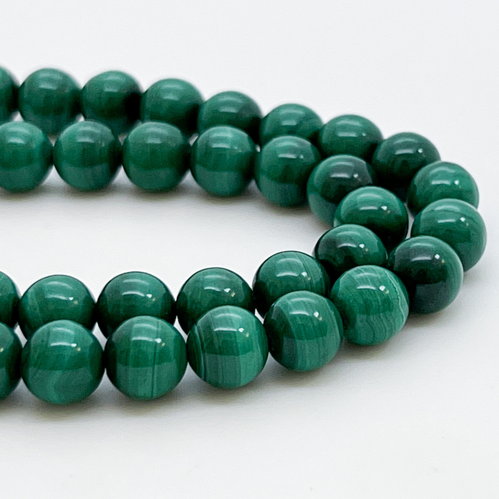 Бусины Малахит, диаметр 8,4-8,5 мм, цена за 12 шт (1/4 нити)