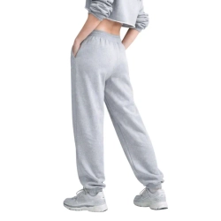 Женские теннисные брюки Nike Sportswear Phoenix Fleece - dark grey heather/sail