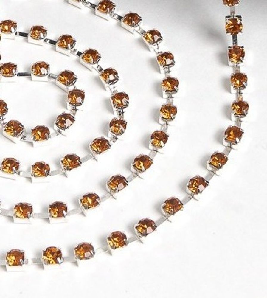 Цепь со стразами, ss16, ш. 4 мм, тёмное золото в серебряной оправе