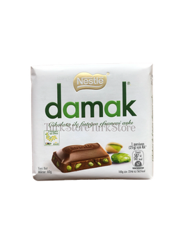Молочный шоколад Nestle Damak с цельными фисташками 60 гр