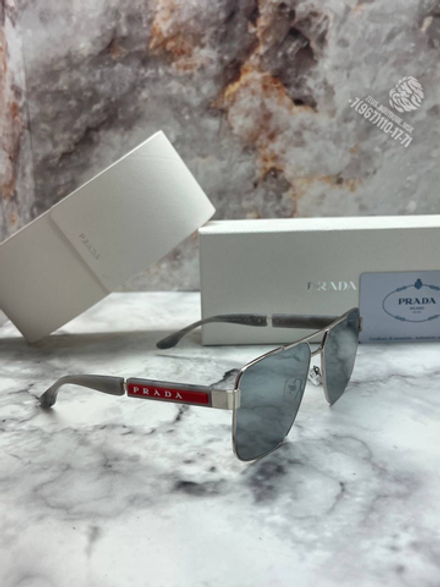 Солнечные очки Prada
