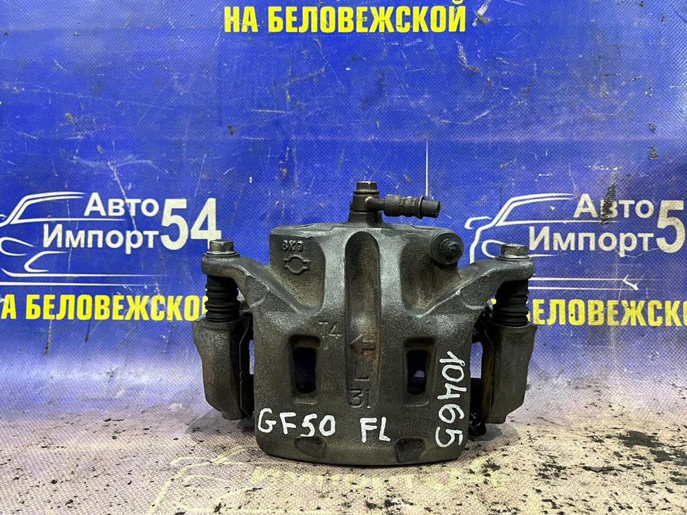 Суппорт тормозной передний левый NISSAN CIMA 2001-2010