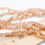 Бусина Треугольник, стекло, цвет абрикосовый, размер около 3*4 мм, цена за нить 32 см