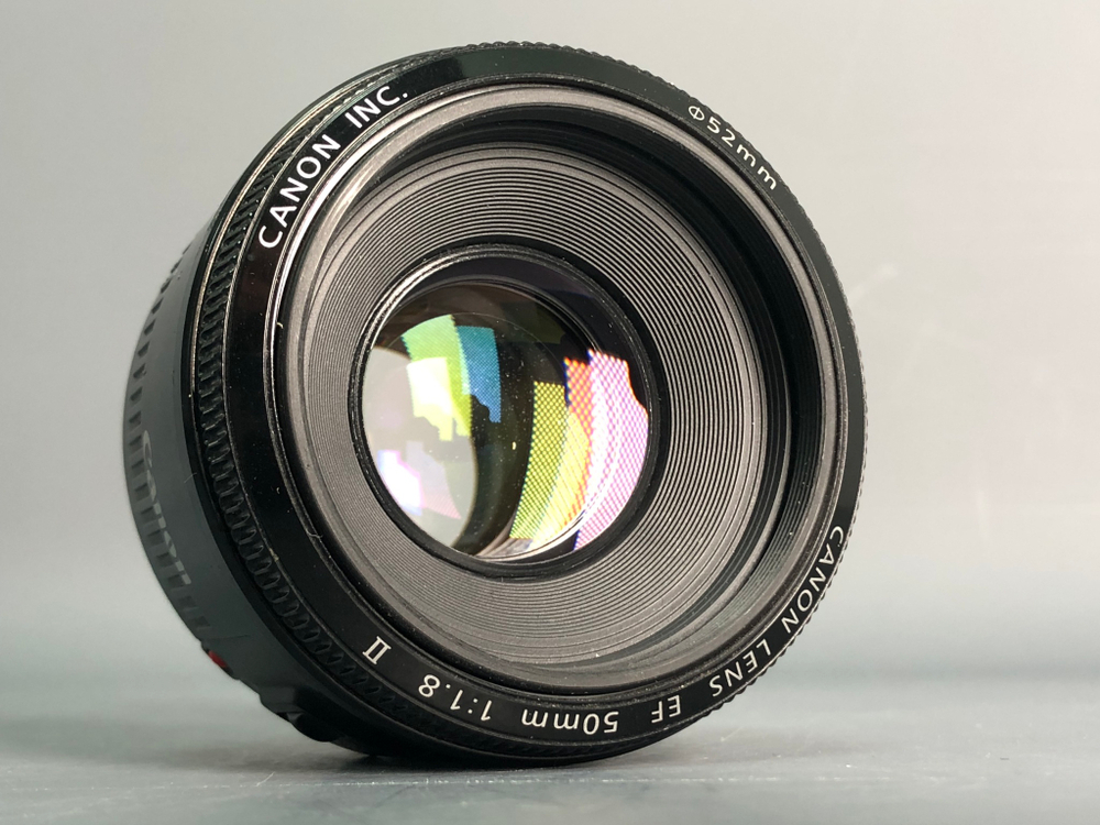 Canon EF 50mm 1.8 II пыль под линзой