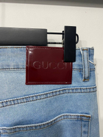 Джинсы Gucci