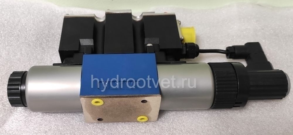 4WREE6V08-2X/G24K31/F1V - Пропорциональный распределитель с обратной связью по положению золотника со встроенным усилителем Ду6, F1 = 4-20 мА, номинальный расход 8 л/мин, схема V