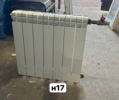 Биметаллический радиатор Б/У 500 7 секц. бок.