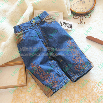 Джинсы с вышивкой на кнопках