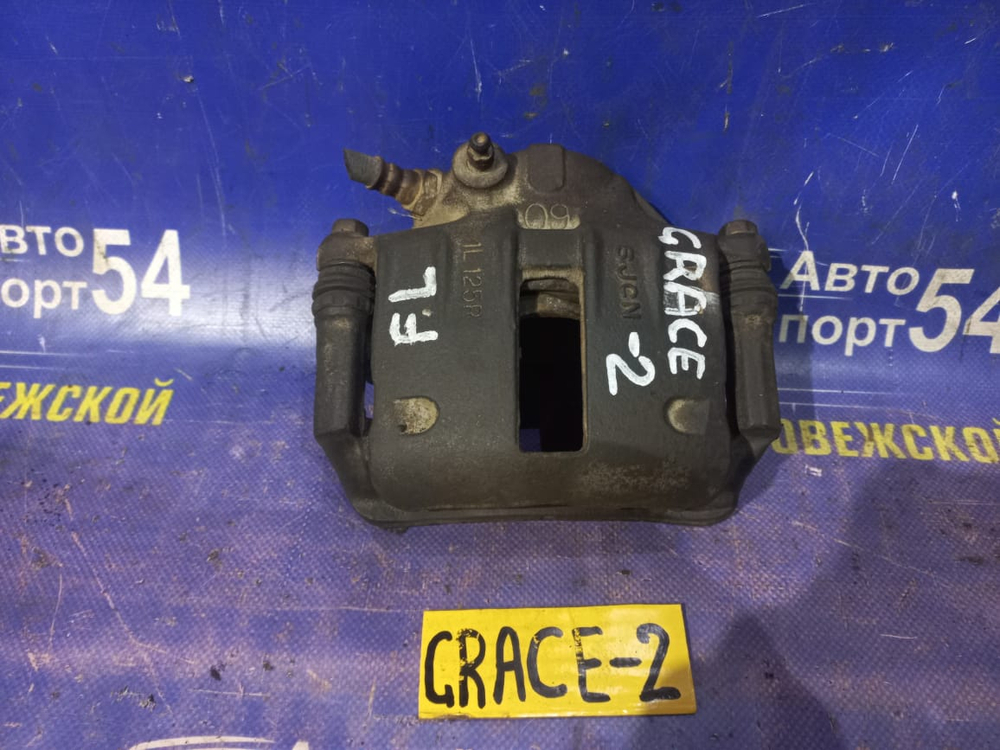 Суппорт тормозной передний левый HYUNDAI Grace 1995