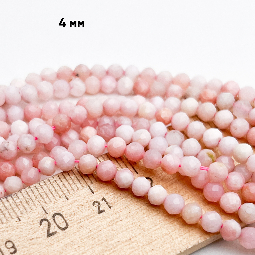 Опал розовый граненый бусины, диаметр около 4-4,2 мм, цена за отрезок 19 см (1/2 нити)