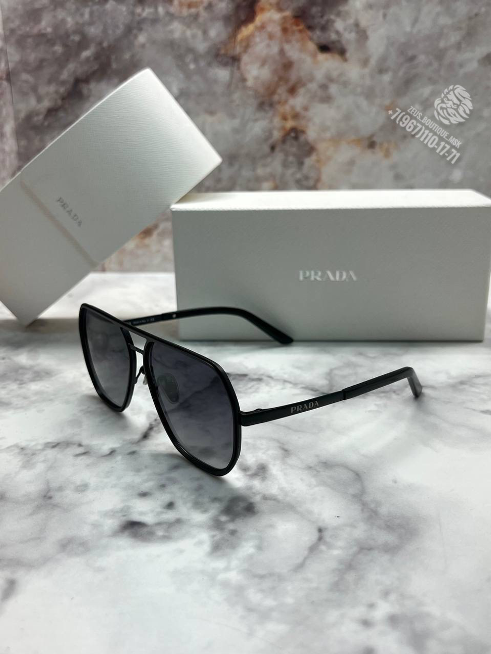 Солнечные очки Prada