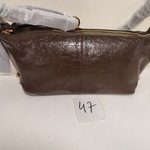 TYRA крем-шоколад - царапина вдоль шва 47