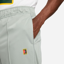 Мужские теннисные штаны Nike Court Heritage Suit Pant - mica green