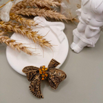 Брошь "Бантик со стразами"