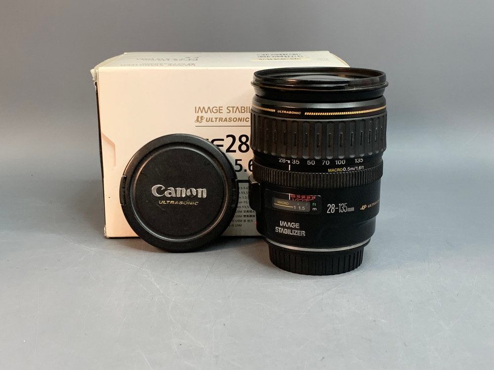 Canon EF 28-135mm 3.5-5.6 IS USM микроцарапинки, внутри пыль