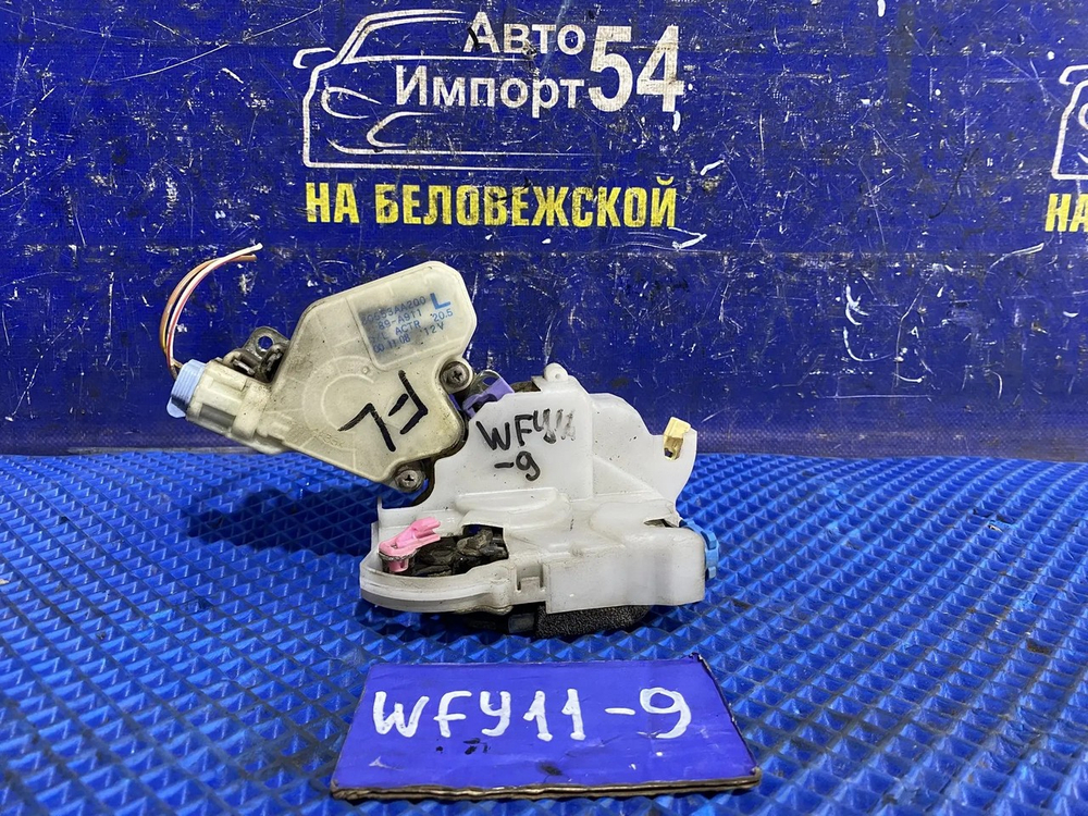 Замок двери передней левой NISSAN WINGROAD 2000