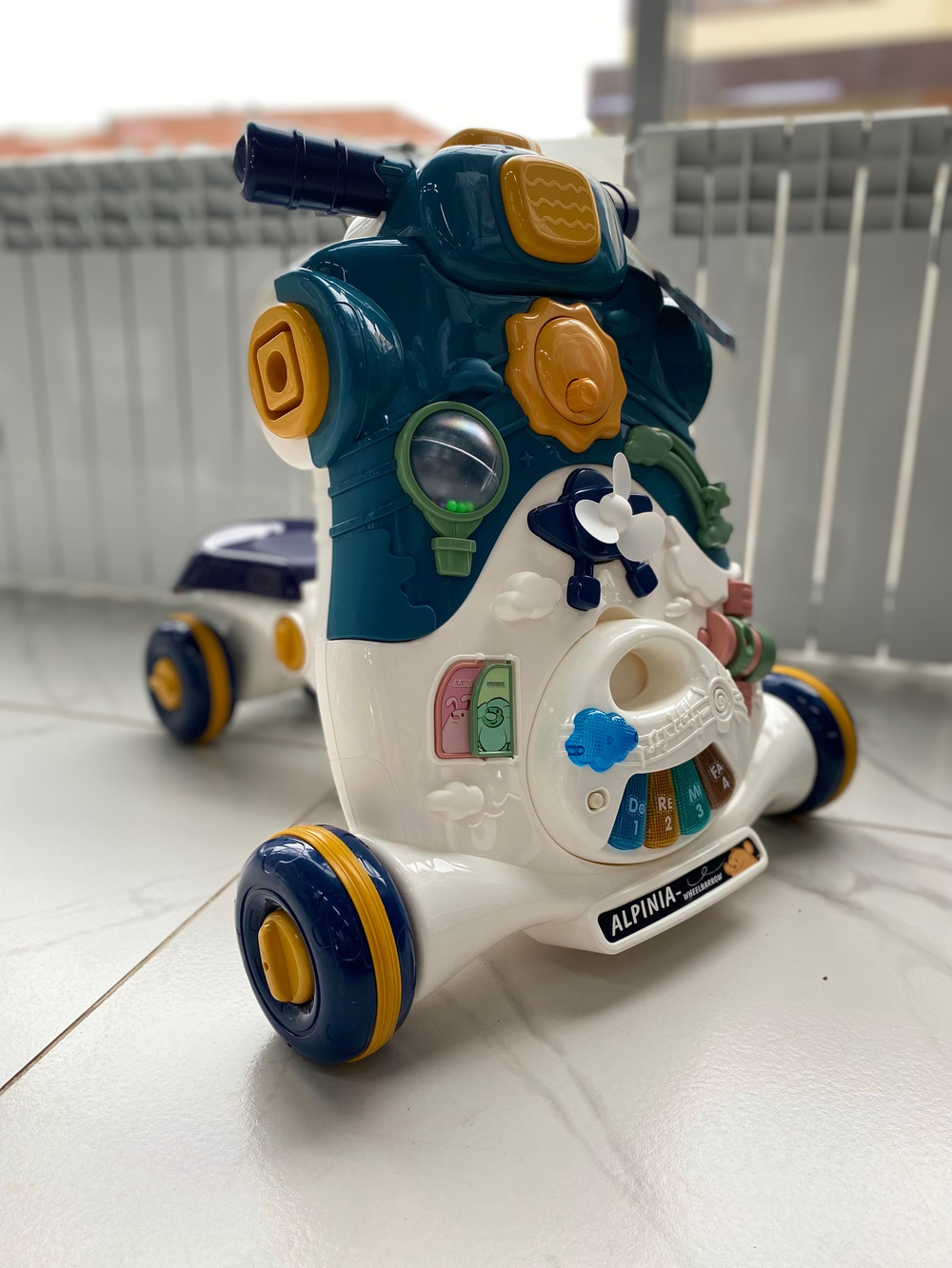 6847617 Каталка-ходунок «Первый транспорт», звуковые и световые эффекты, цвет синий