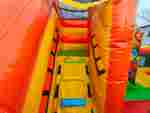 Коммерческий надувной батут «Весёлые динозаврики» с горкой, 5*4*2,8 м