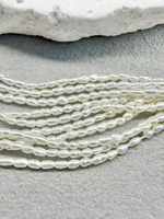 Натуральный барочный жемчуг супермелкий 1,5-2 мм, кремовый, нить 18 см