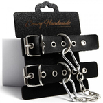 Наручники однослойные, прямоугольной формы, чёрного цвета