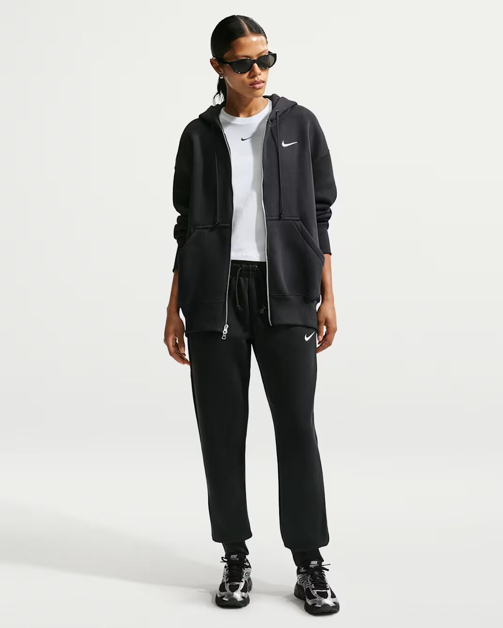 Nike Sportswear Phoenix Fleece Женские спортивные штаны с зауженным кроем - NIKE