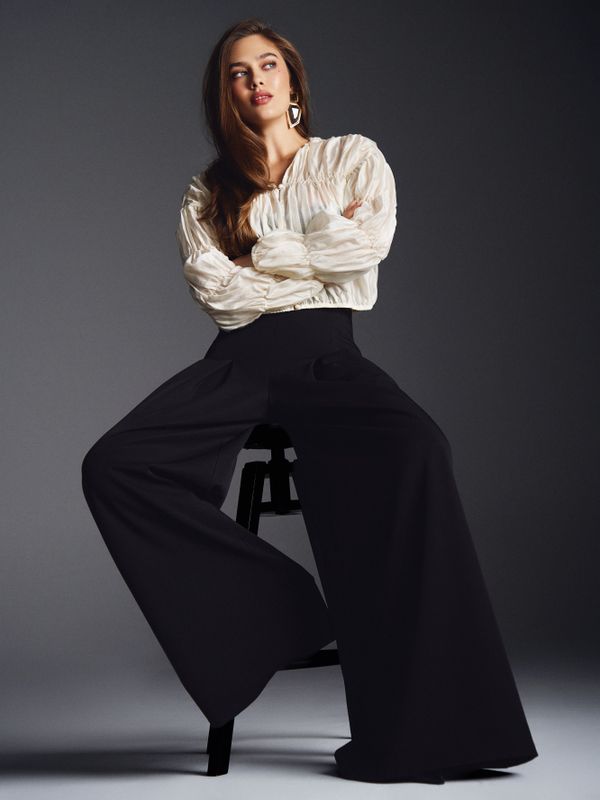 Брюки с защипами 