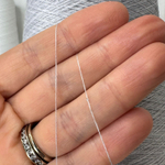 TRANSFORMARE ; 50% кашемир, 50% PVA, ; 2500м /100гр; цвет: светлый серый, пайетки серебро. Есть бобинки: 39, 150 гр.