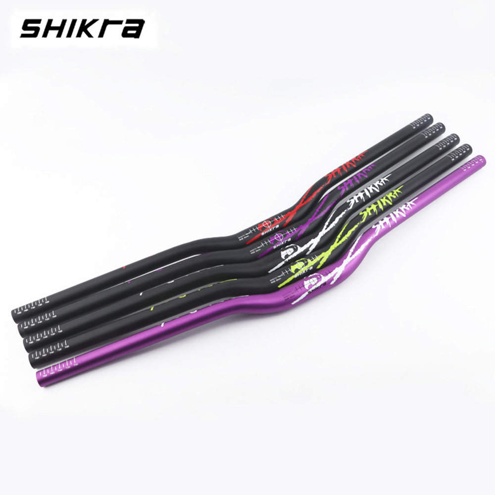 Руль Shikra 31.8 фиолетовый принт, длина 785 мм, подьем 30 мм.315 гр.