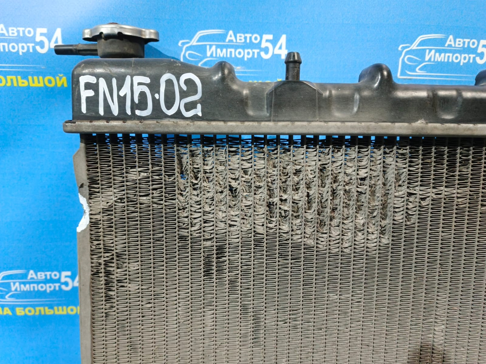 Радиатор двигателя NISSAN PULSAR 1999