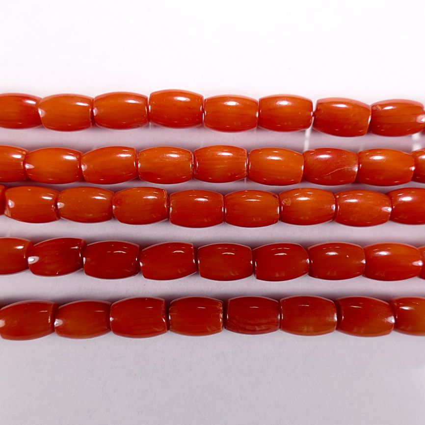 Нить бусин из коралла оранжевого, облагороженного, фигурные, 5x7 мм (овал-бочонок, гладкая)
