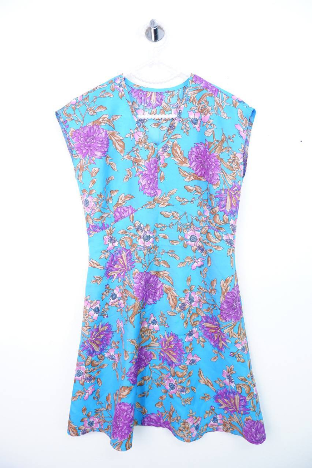 Топ удлиненный и приталенный, визуально 44 размер