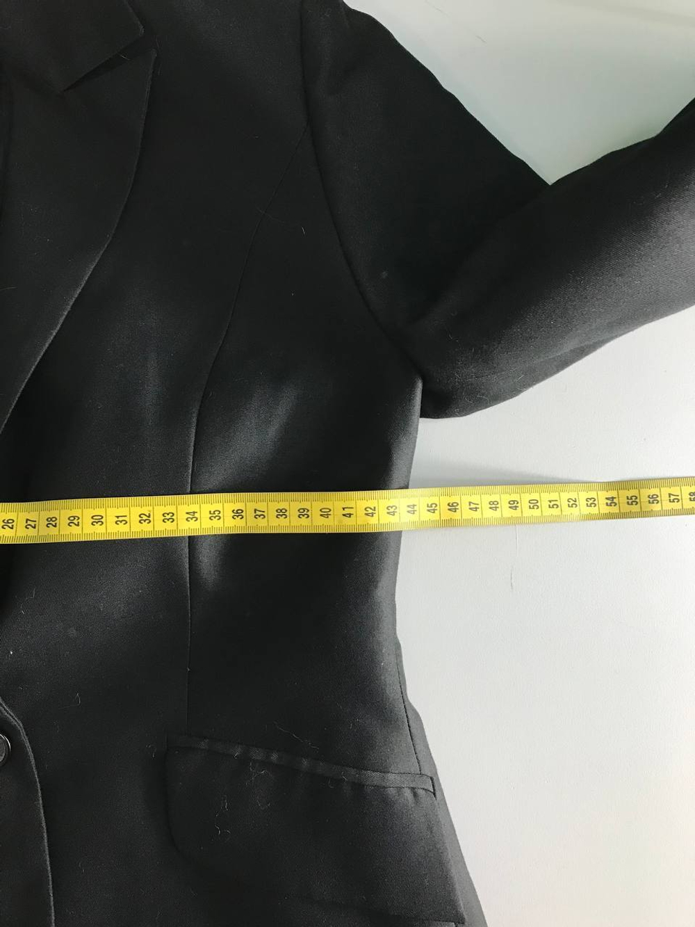 Жакет сдержанный, визуально на 44 размер