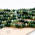 Нефрит бусины, размер около 5,5*3,5 мм, цена за 28-29 шт (1/4 нити)