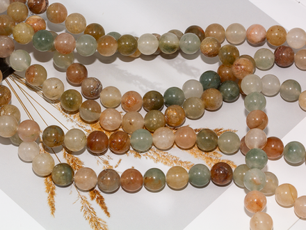 Нить бусин из тонированного кварца 10,5мм