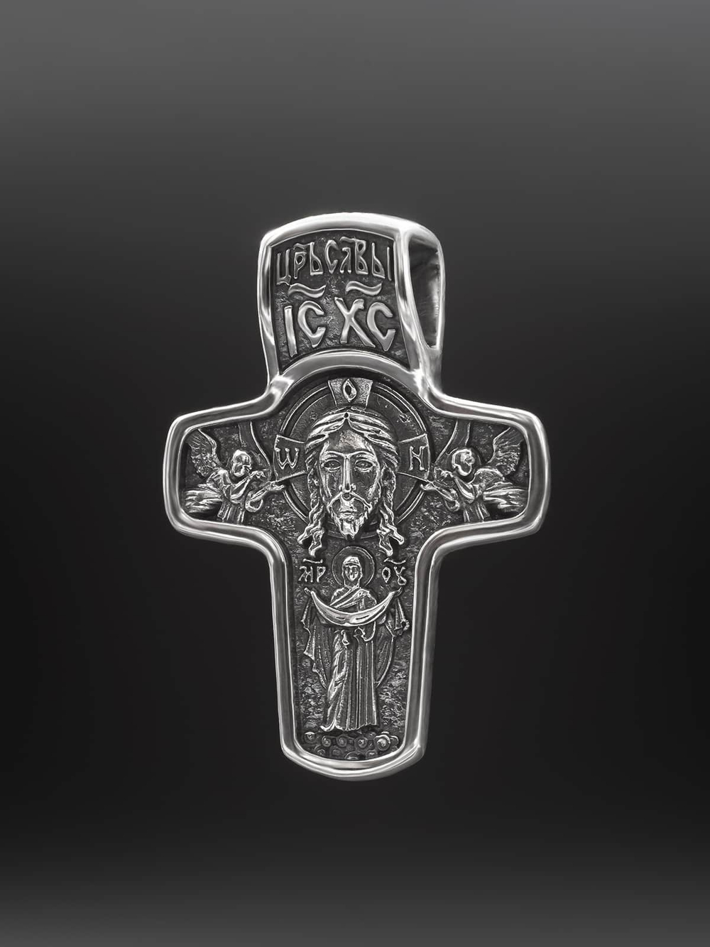 Фотография крестика из серебра с ликом Николая Чудотворца