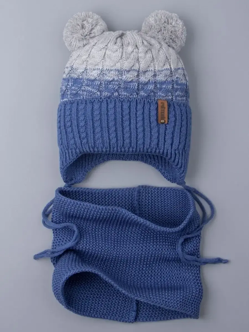 Шапка вязаная для мальчика на завязках и снуд