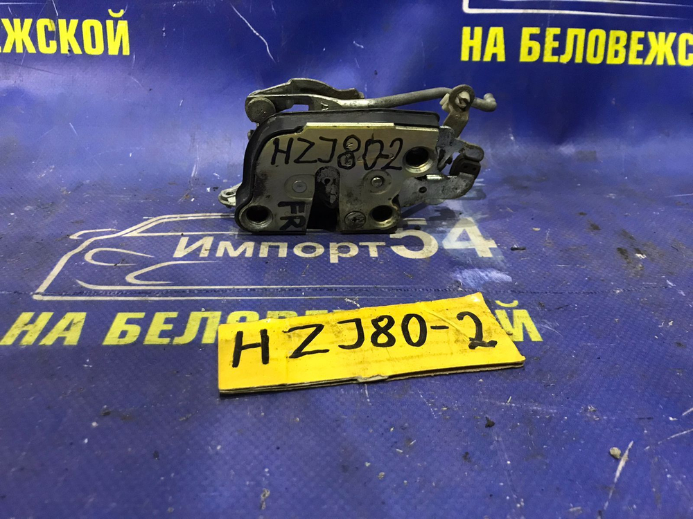 Замок двери передней правой TOYOTA LAND CRUISER 1990