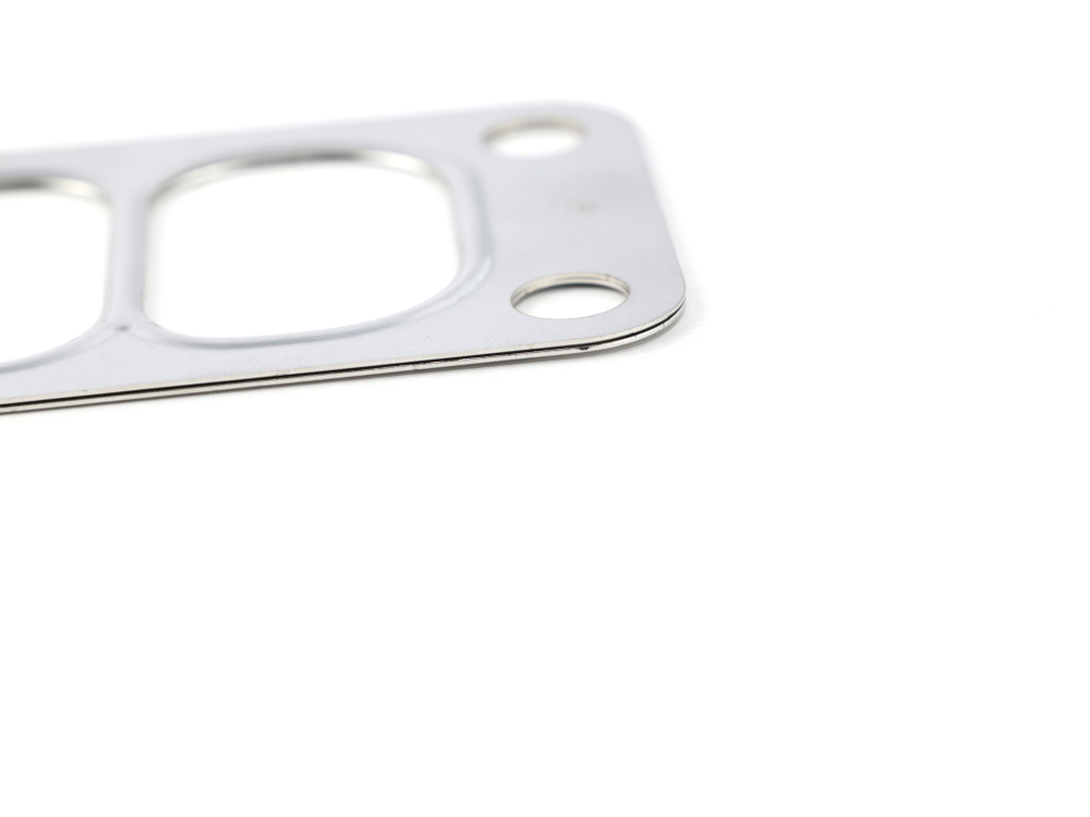 Прокладка турбокомпрессора впуск дв. WEICHAI WP7, CUMMINS ISBE, ISLE, 4BT а/м МАЗ, КАМАЗ, SHACMAN, SHAANXI (металл, прямоугольная с перемычкой 2-х слойная, 3901356, 610800110006, 3709861, 66*48мм.) RUATI