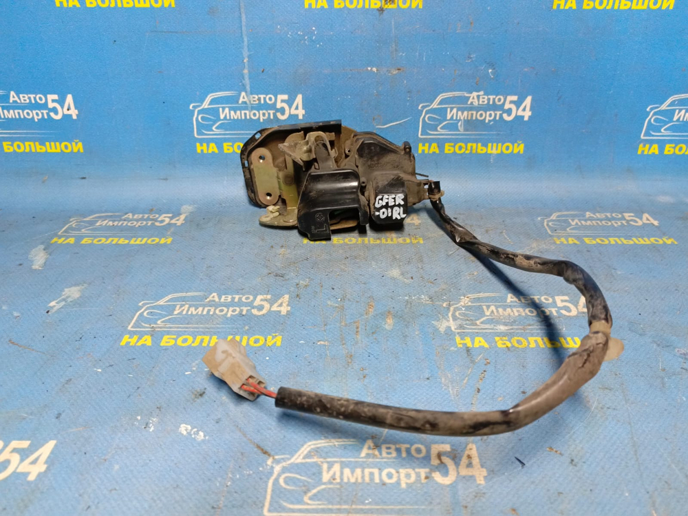 Замок двери задней левой MAZDA CAPELLA 1998