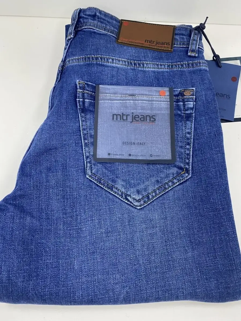 Джинсы мужские