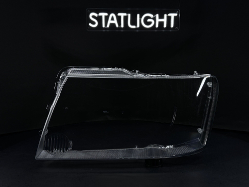 Левое стекло фары Nissan Patrol Y61 2004-2024 рест