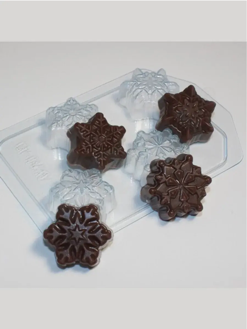 Форма пластиковая  для конфет Снежинки мини 4 ячейки