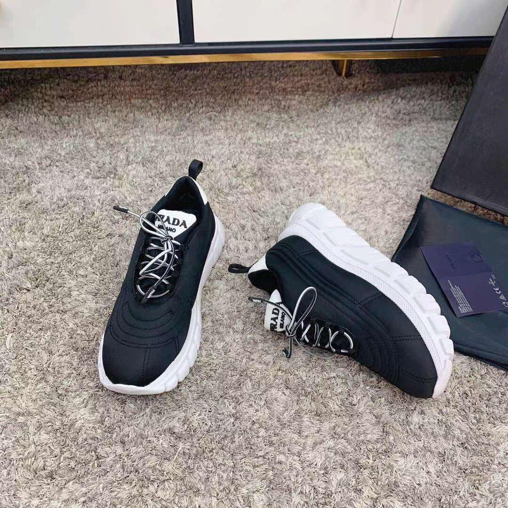 Кроссовки Prada