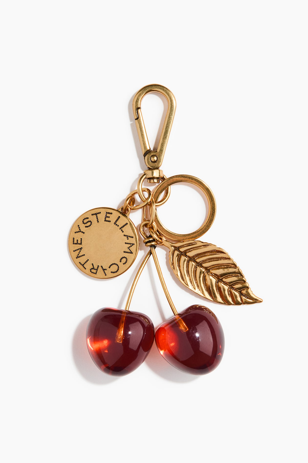 H&M - Stella McCartney Брелок для сумки в форме вишни, золотистый