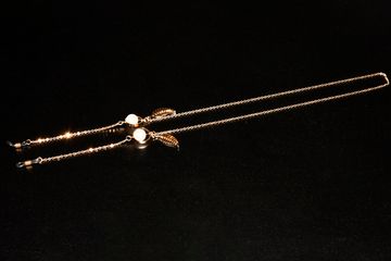 Цепочка золотистая жемчужина и листочек WH043, 75 см