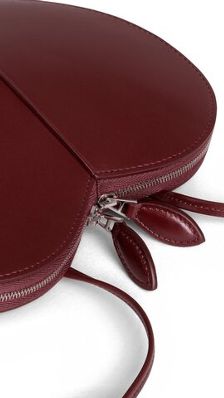 ALAIA СУМКА LE CŒUR ИЗ ТЕЛЯЧЬЕЙ КОЖИ, ГРАНАТОВЫЙ