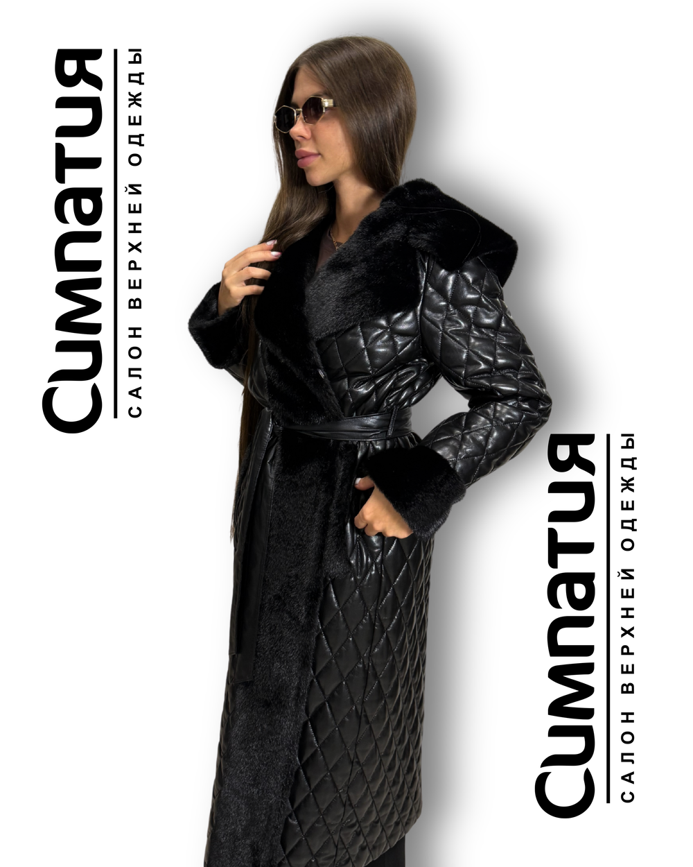 Стильное пальто в черном цвете с декоративными рукавами