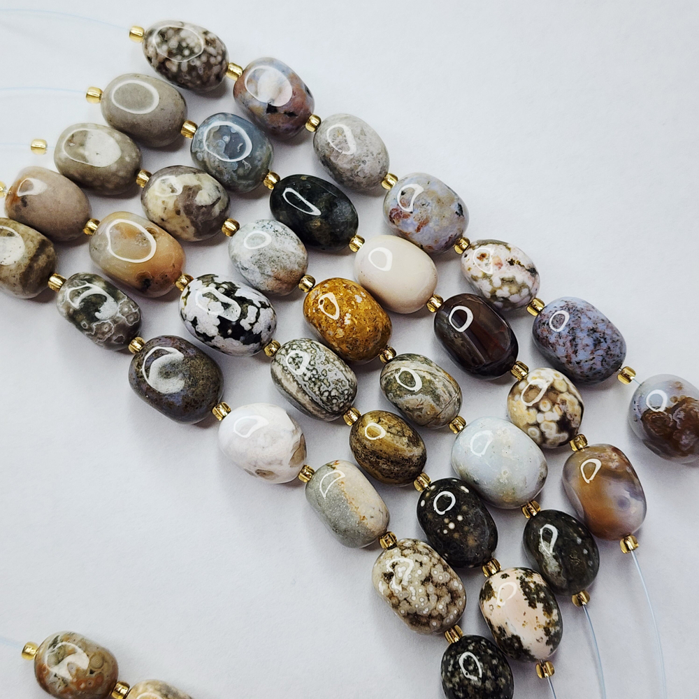 Океаническая яшма, риолит, крупная галтовка, 12-15 мм, овалы, цена за нить 12.5 - 13 см (1/3 нити)